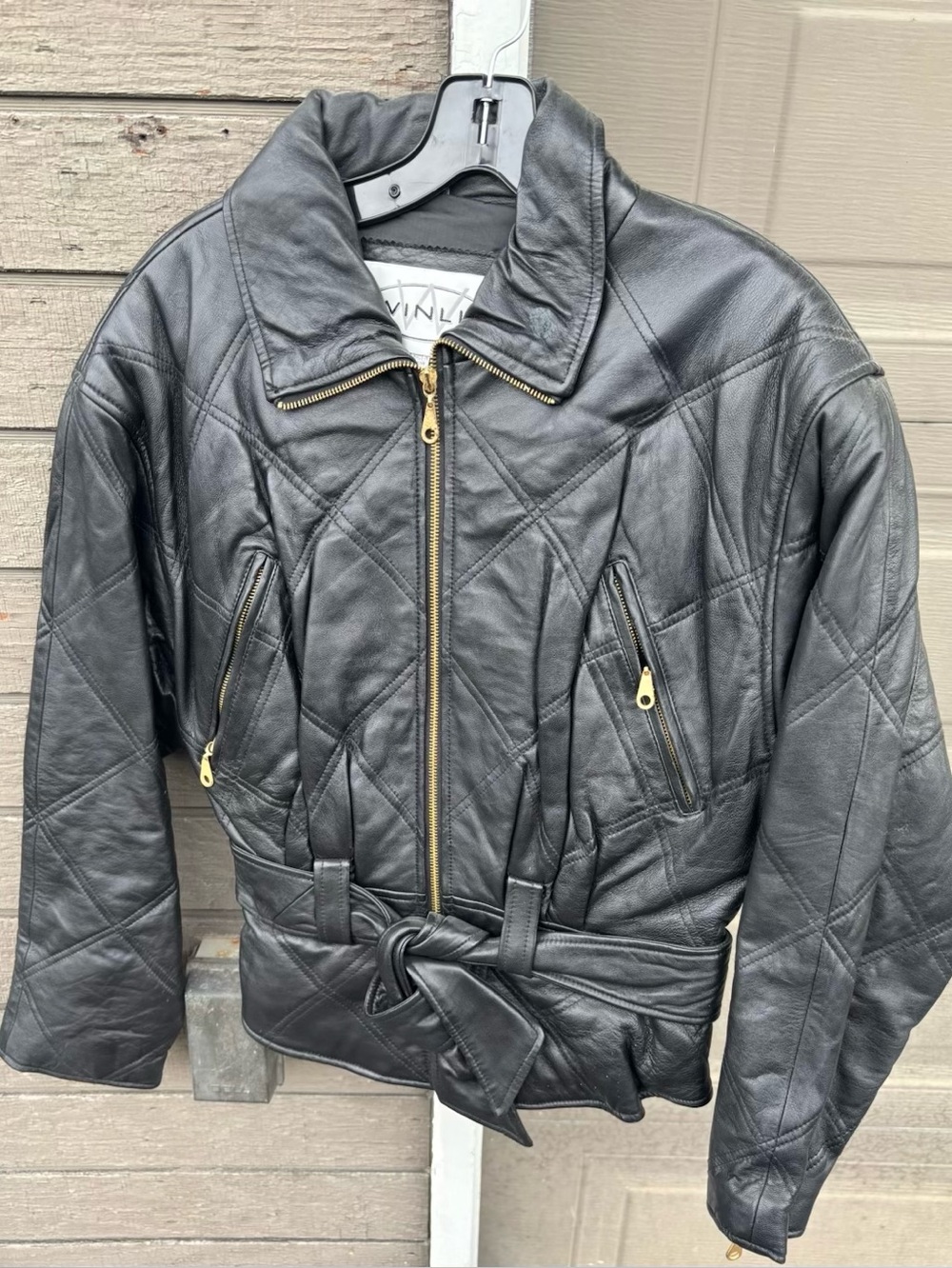 Black Quilted Leather Belted Jacket.